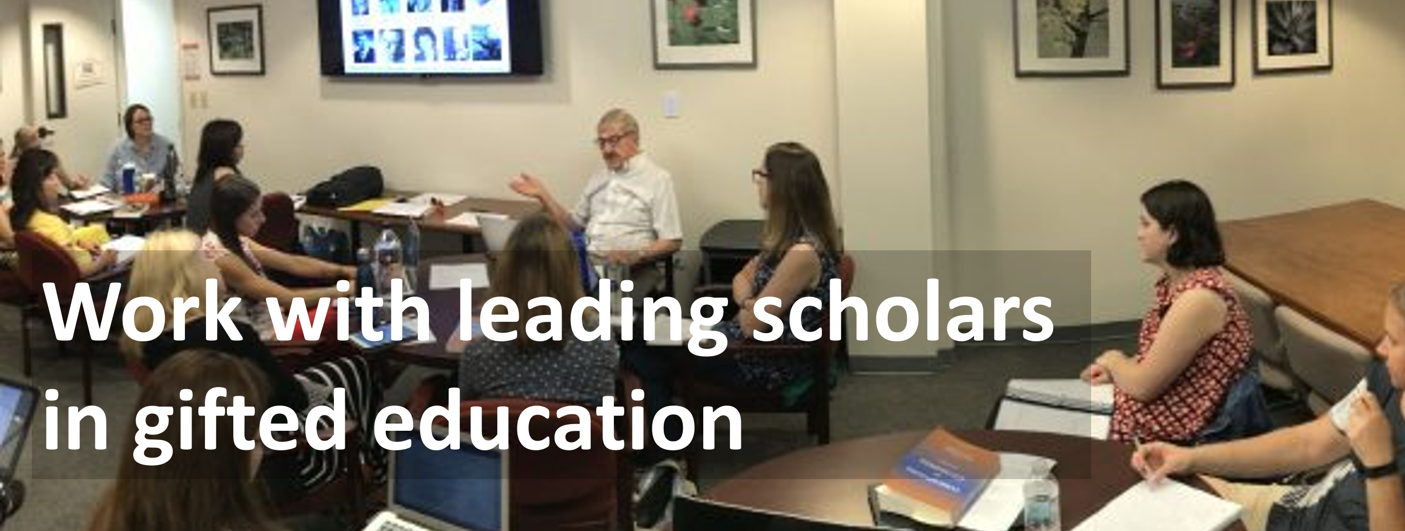 Photo of Joe Renzulli teaching class with a caption, "Work with leading scholars in gifted education."